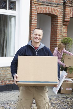 Removal van and moving boxes ready for a same day move in Hounslow