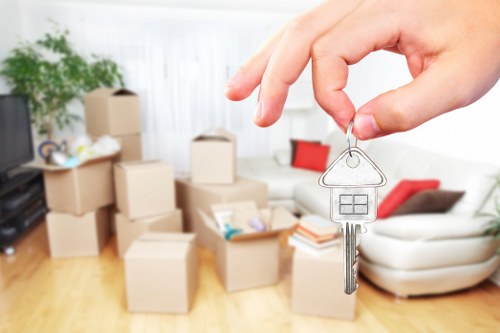 Removal team planning a home move in Hounslow with boxes and furniture