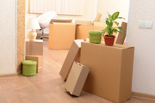 Organised office relocation setup with labelled furniture and boxes