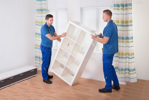 Furniture and boxes being transported by removal van in West London