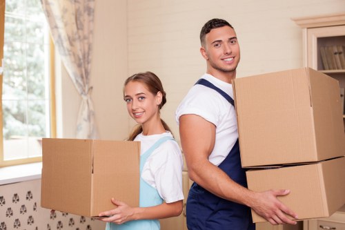 Staff preparing desks and files for an office move in west London