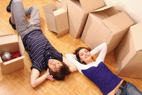 Unpacking service arranging items into rooms after a move