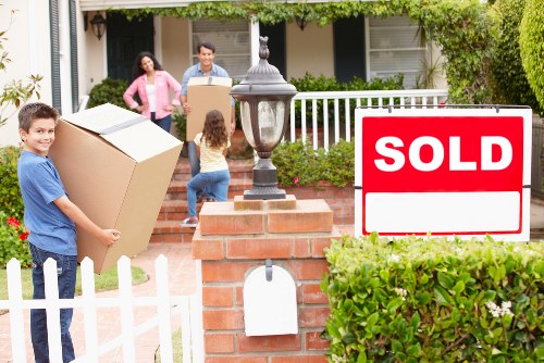 Careful loading of student belongings for a local Hounslow relocation