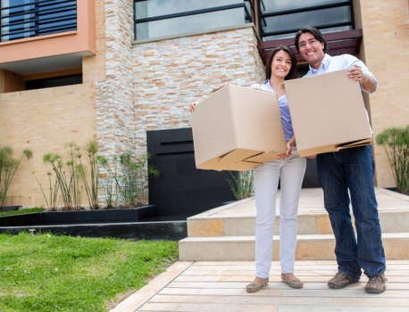 Removal staff loading commercial items during a Hounslow relocation